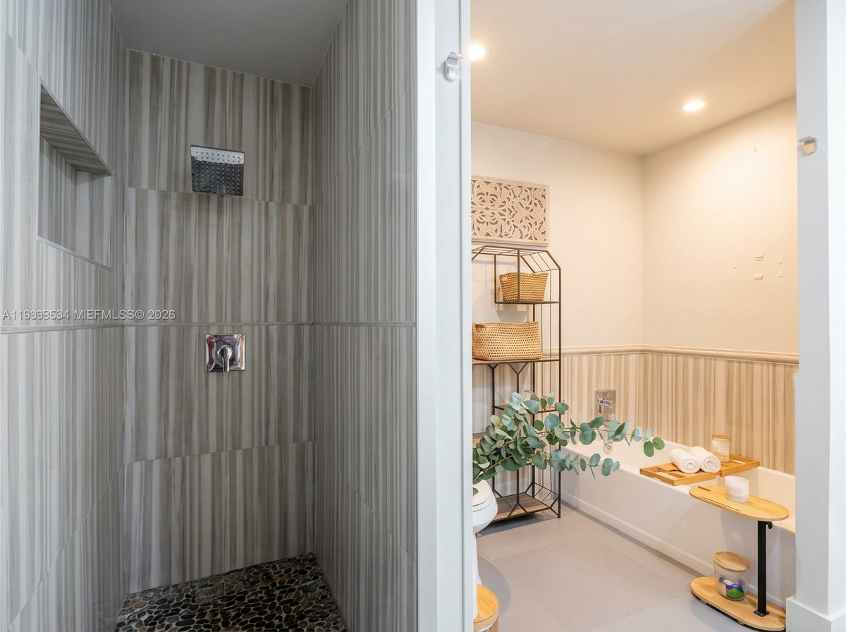 Walk-in stone shower and soaking tub